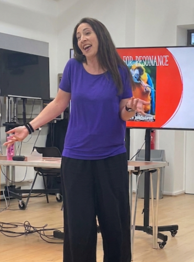 Tania Valentin, voice and accent coach, giving a presentation on voice and communication
